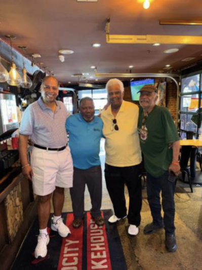 Ronny Lancaster, WG’75, Eugene Aaron, WG’73, Merritt Brown, WG’74 and Campbell Johnson WG’73 art a lunch in Washington, DC.